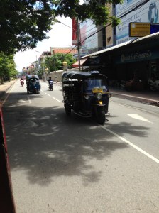 Some overpriced tuk-tuks driving by
